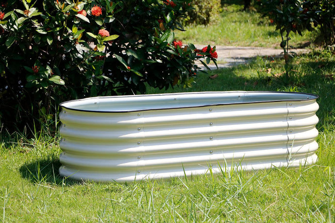 What are the benefits of using compost on a modular metal raised garden bed?